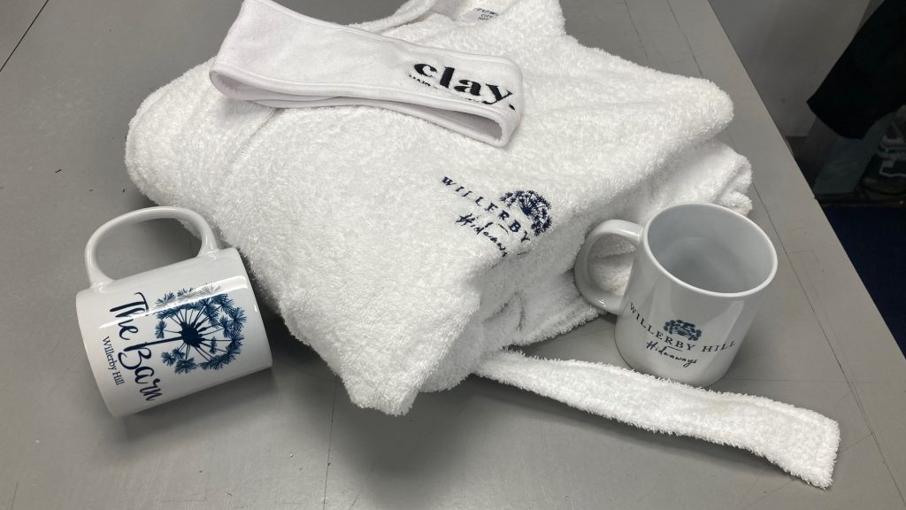 Branded gowns, mugs and headbands